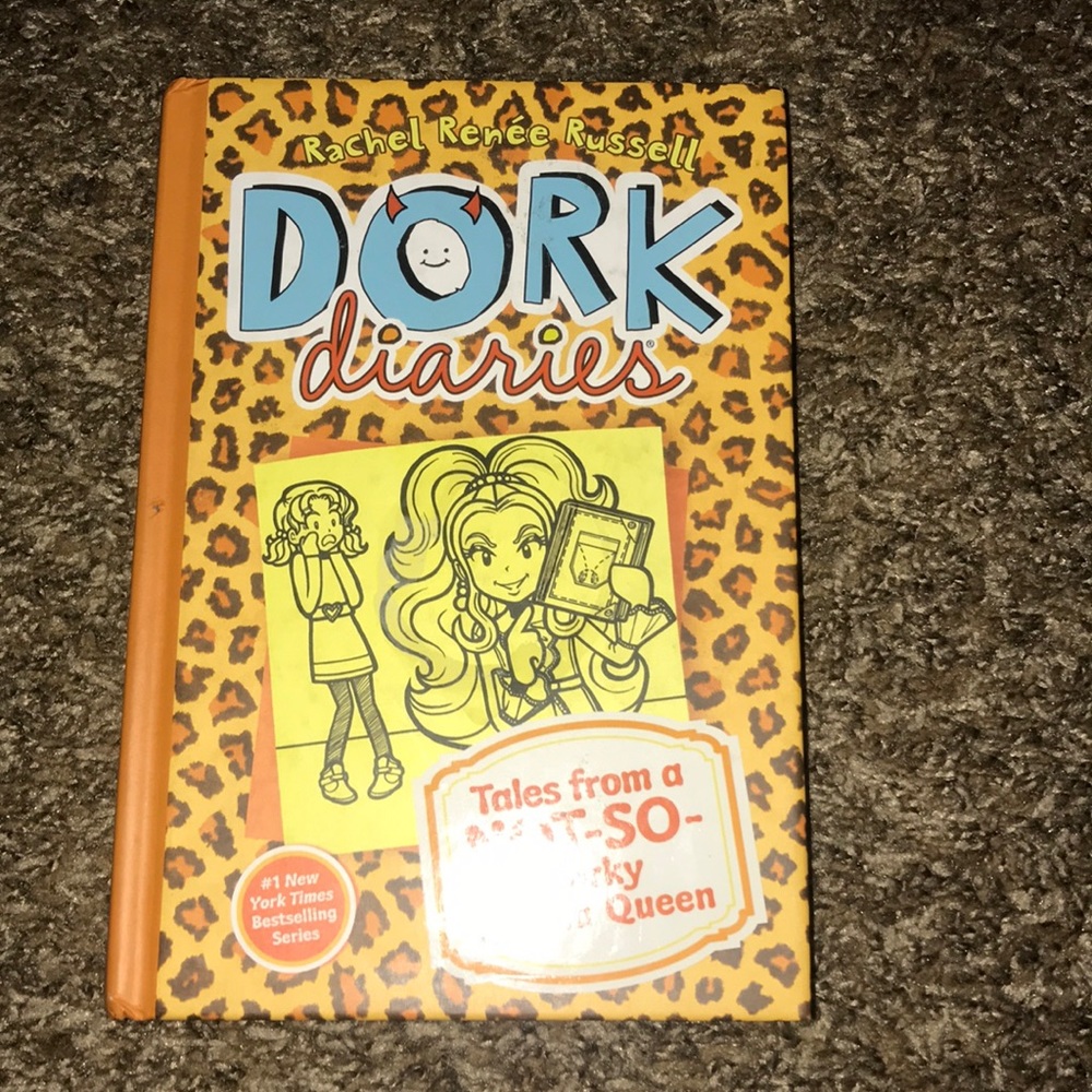 A hardcover dork diaries book.